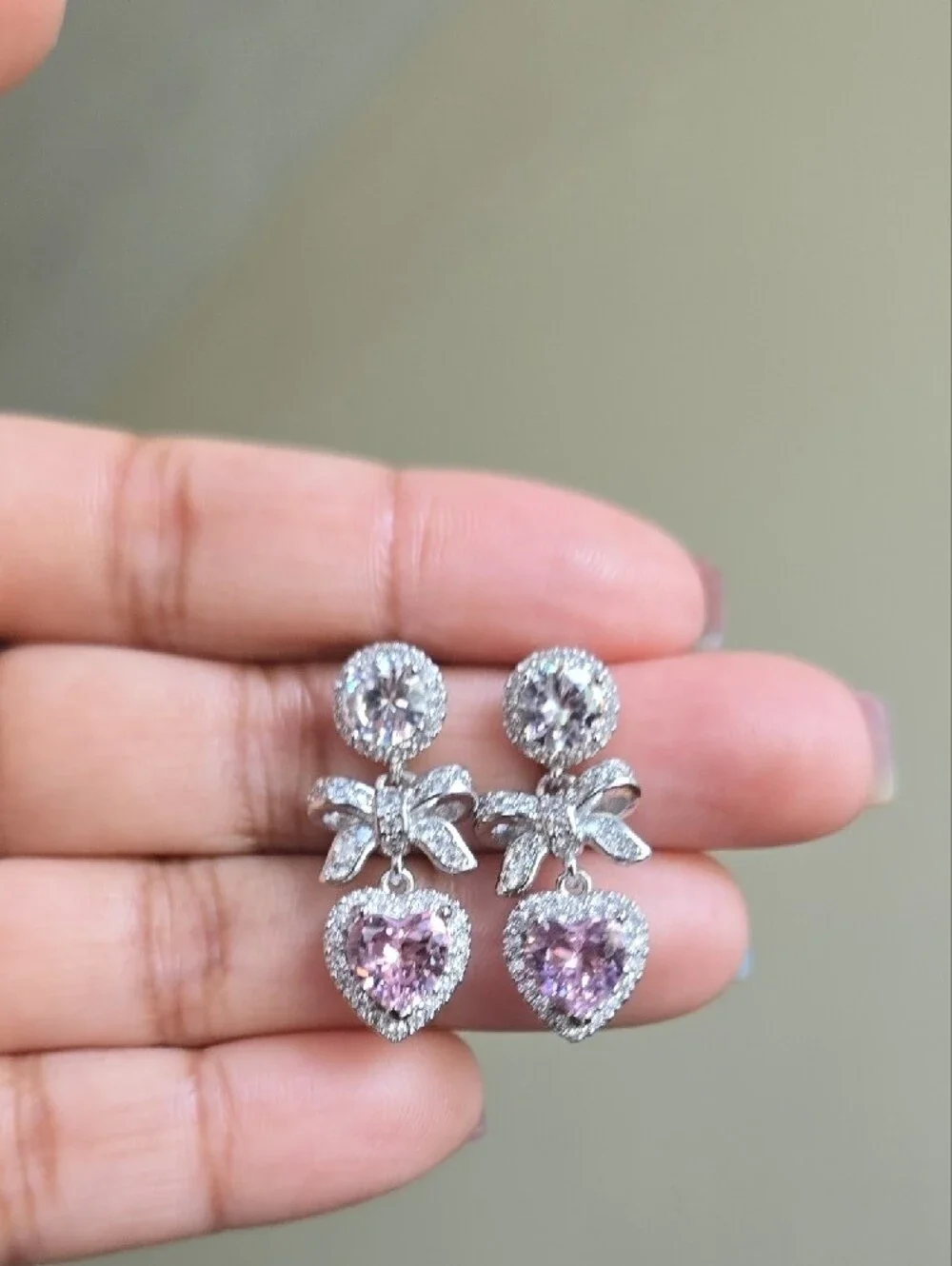 Sterling Silver Bow Drop Earrings with Pink Moissanite